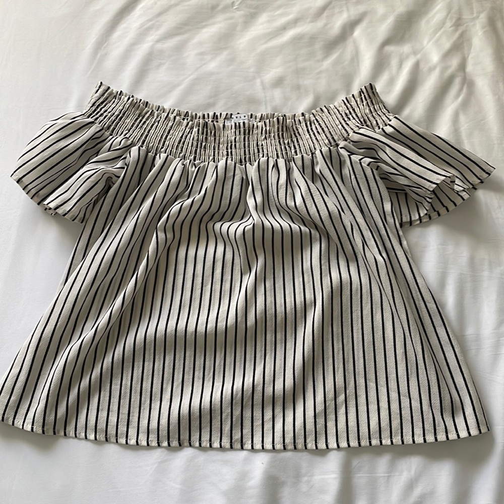 Off the shoulder blouse. Size L. Only worn a few times in great condition!